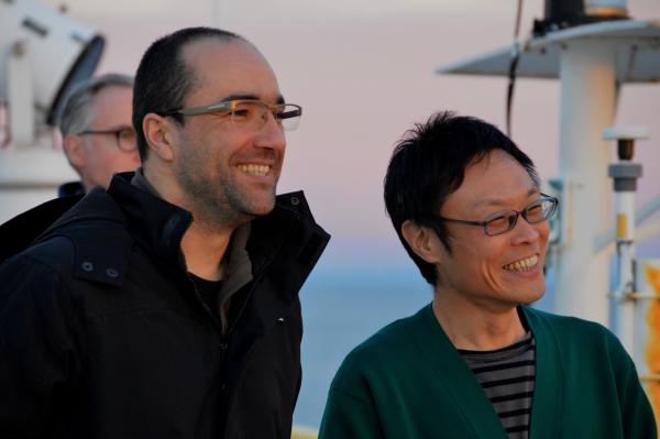 Manuel Teixeria (left) and Kosuke Egawa (right) on the steel beach enjoying the sunrise